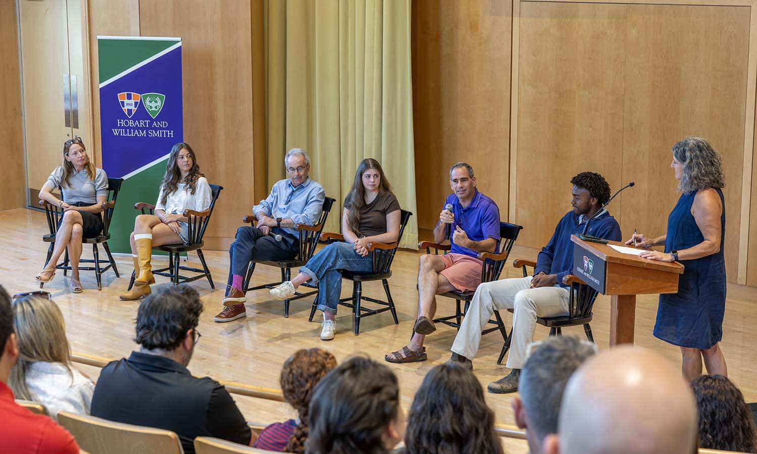 During a panel hosted by Associate Provost Susan Pliner, Professor of Music Katherine Walker, Emma Butry ’27, Professor of Business Management and Entrepreneurship Tom Drennen, Zoe Neiderbach ’27, Professor of Chemistry Justin Miller and Nicholas Short ’27 speak about the HWS experience to prospective students and their families during the Admissions Open House. 