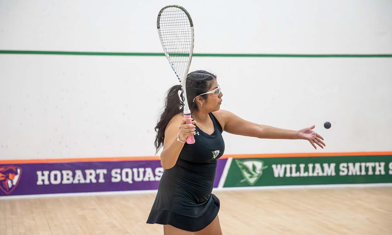 Kimberly Javier ’27 serves during her victory over Chatham University. 