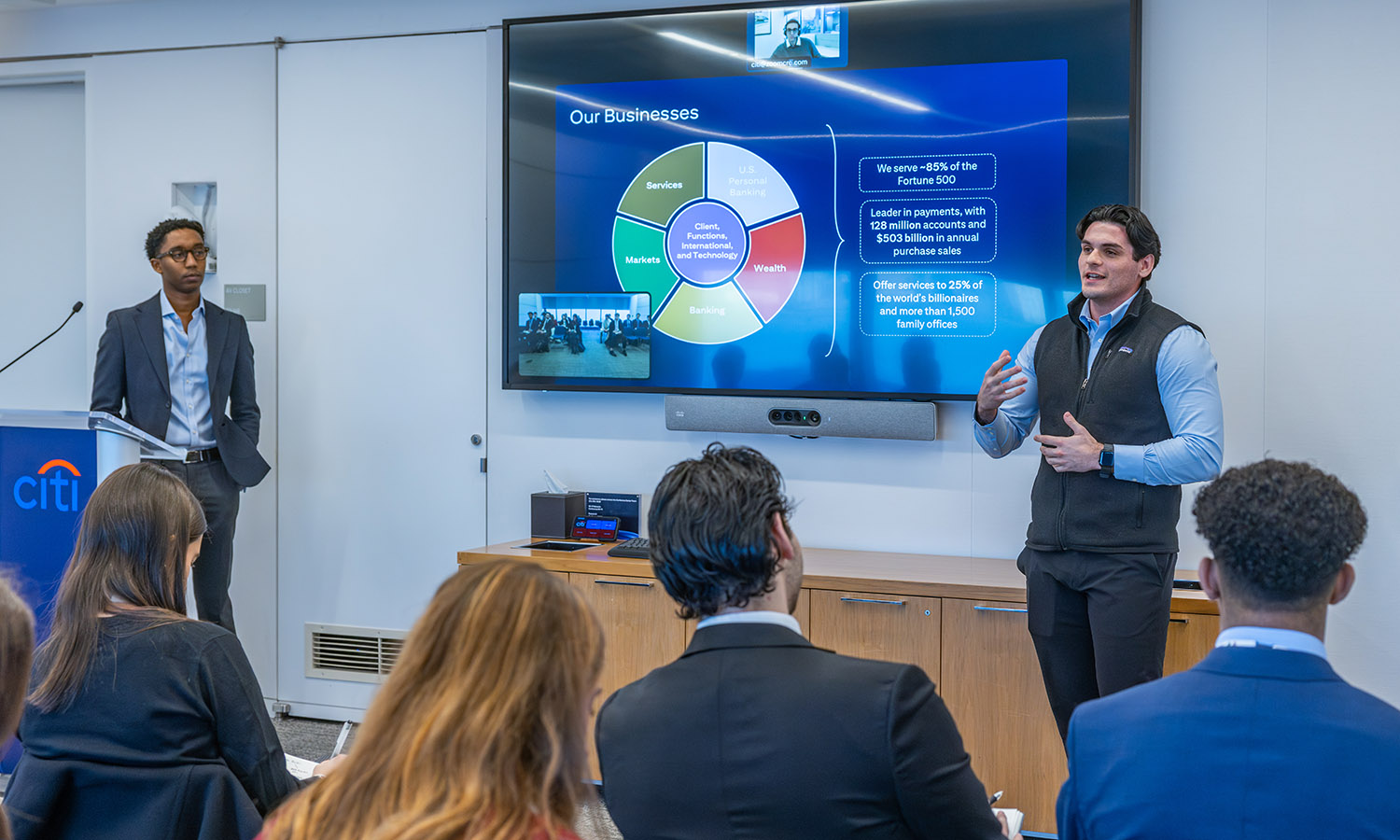 Investment Advisor Darius Brummell '21 and Global Wealth Analyst Matthew Brand '24 discuss the financial services Citi offers to customers. 