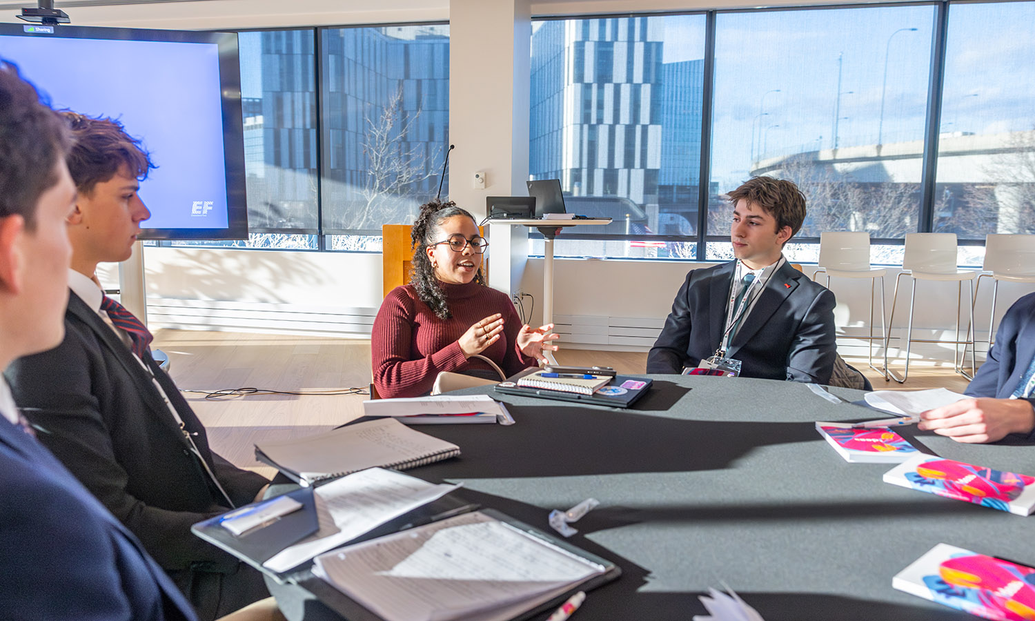 Niima Sellah ’23 speaks to students about the benefits of working at Education First. 