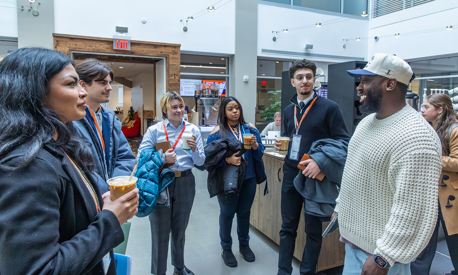 Students chat with Sales Director-Inbound Sales at HubSpot Jean-Bernard Baptiste '14. 