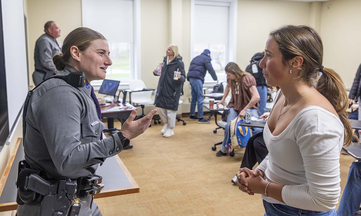 New York State trooper Emma Faso ’23, MSM ’24 speaks with Katie Ingle ’27 about her career path after graduation following the conclusion of “Sociology of Police and Policing” with Professor of Sociology Jim Sutton. 