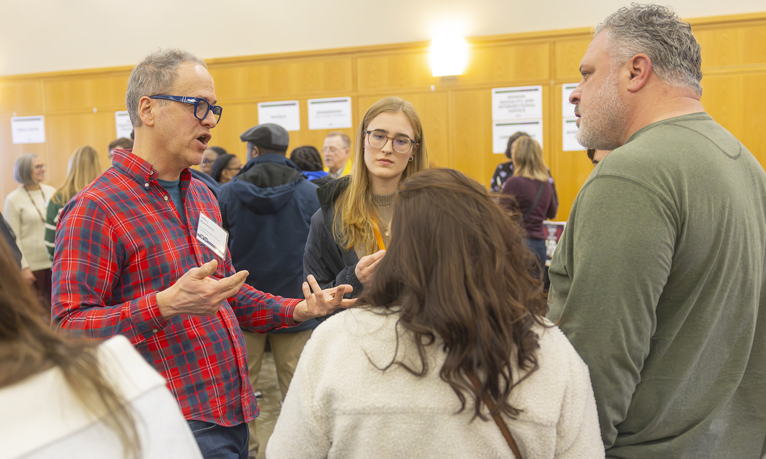 Associate Professor of Art and Architecture Jeffrey Blankenship speaks to admitted students during the academic and experiential expo.  