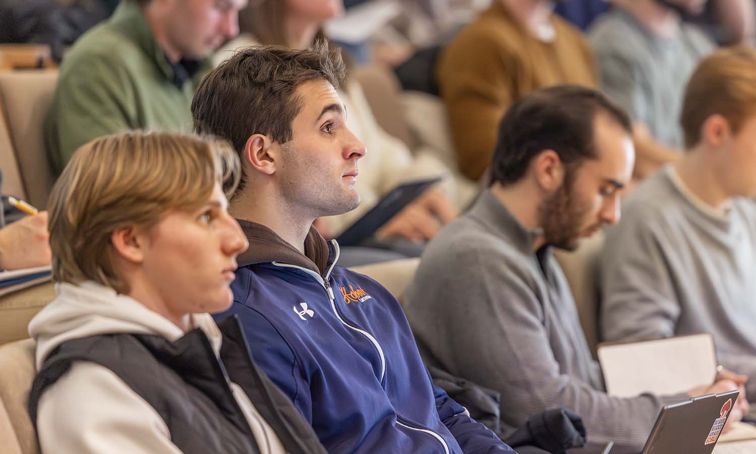 Mike Valent ’27 listens as The Skimm cofounders Danielle Weisberg and Carly Zakin share career advice during “Leadership and Learning in Entrepreneurial Ventures.” 