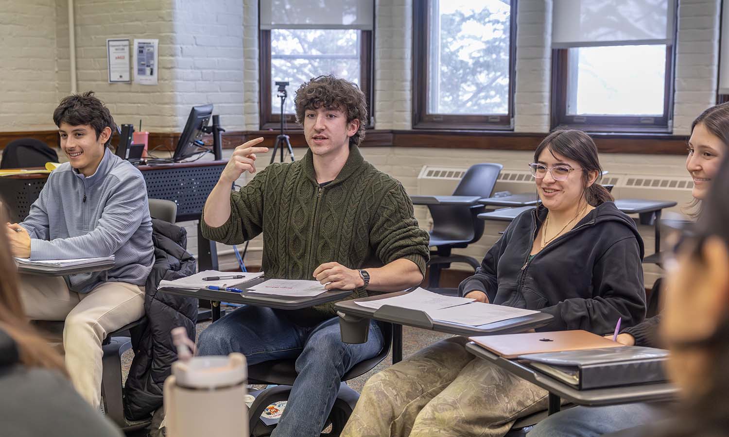 During “Spanish for Conversation and Debate” with Professor of Spanish, Latin American and Bilingual Studies Carolina Travalia, Thomas Coughlin ’28, Henry Snider ’29. Isabella Ibarra ’29 and Brynn Schneider ’29 engage in a debate exercise during class. 