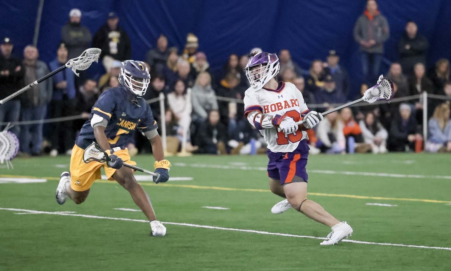 Daniel Cano ’28 unleashes a shot during the Hobart lacrosse team’s season opener inside the Poole Family Dome. He matched his career-high with four points, including his first career hat trick, in the Statesmen’s 13-8 victory over Canisius. 