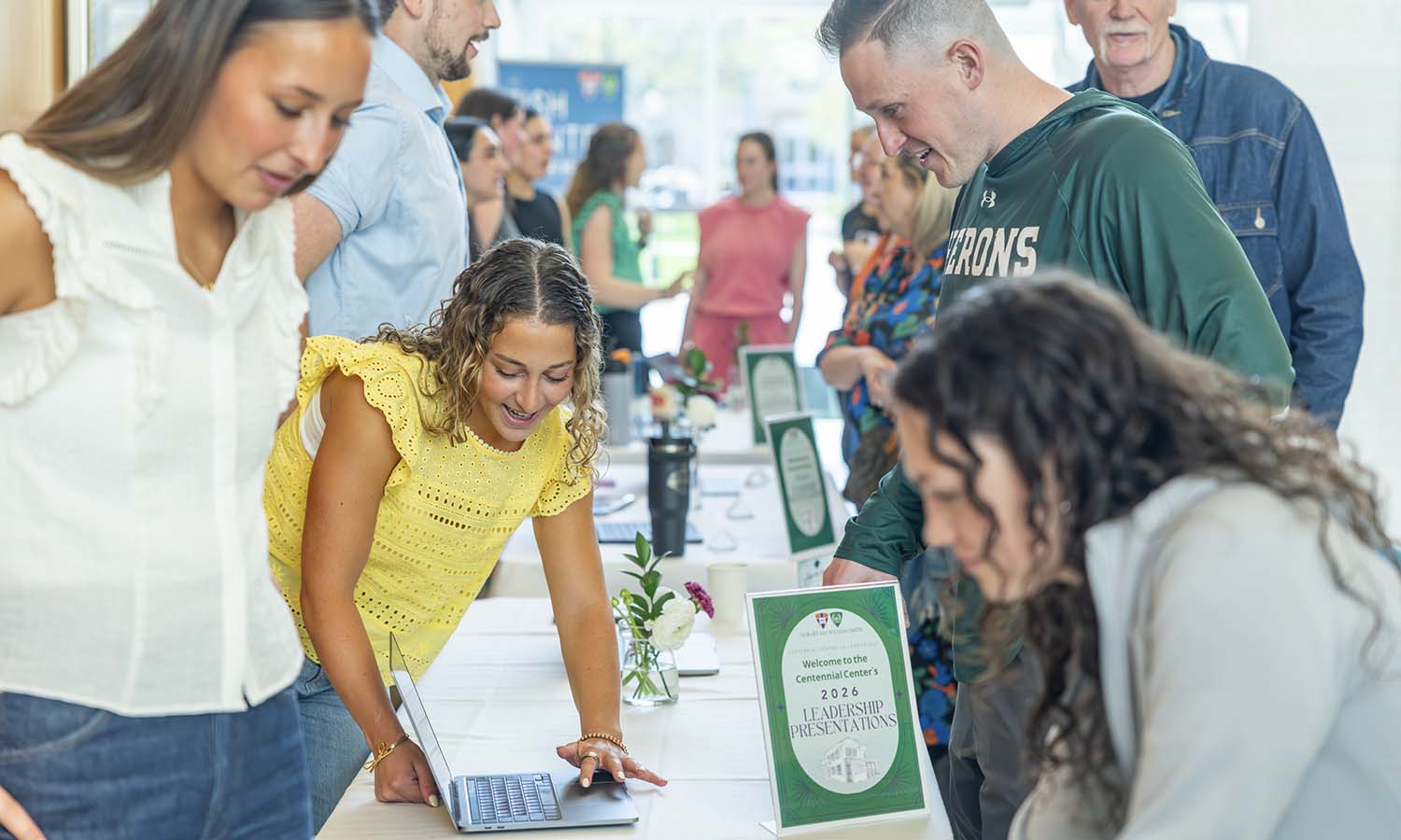 Emily Blight ’26 presents her e-portfolio to William Smith volleyball head coach Derrick Williams at the “Leveraging Your Leadership” session in the Melly Lobby of the Gearan Center. 