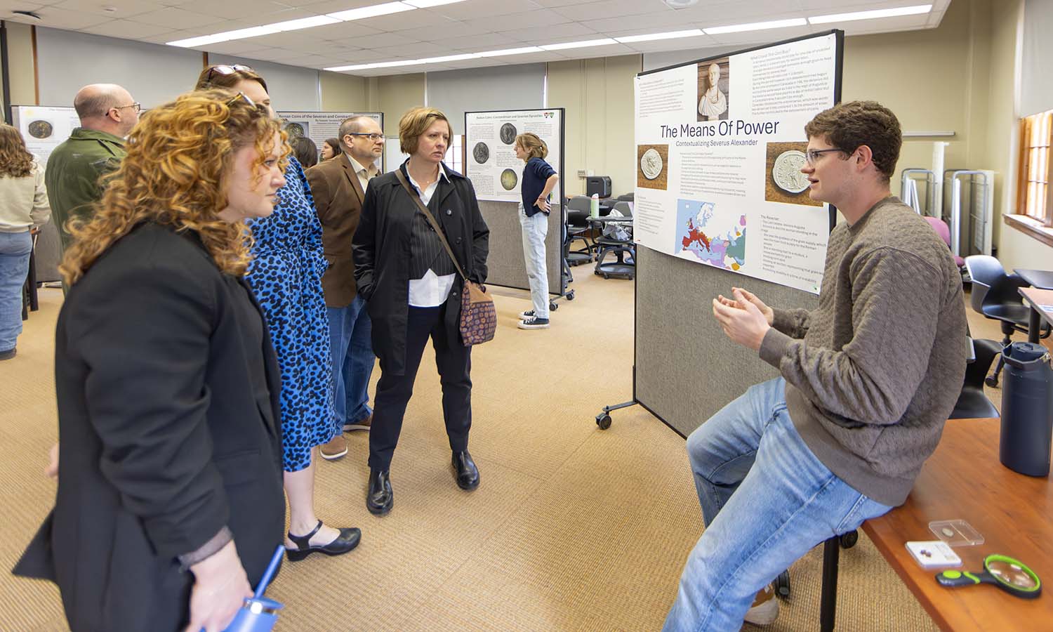 Christian Kneaskern ‘28 discusses his research on the denari, an ancient coin used in the Roman Empire.  