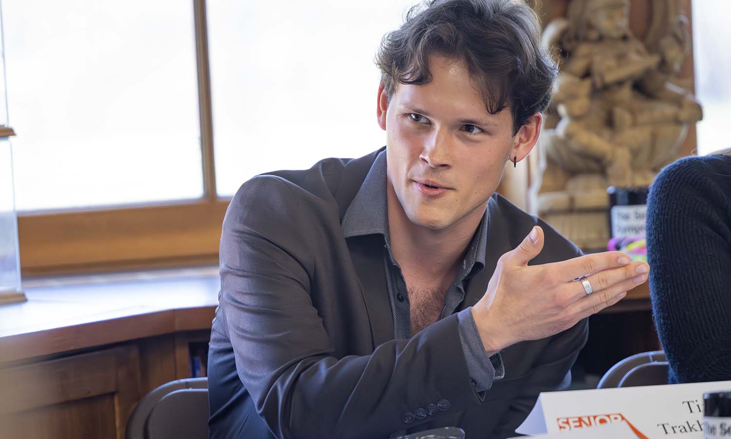 Tim Trakhachov '26 answers a question about his design project during Senior Symposium.  