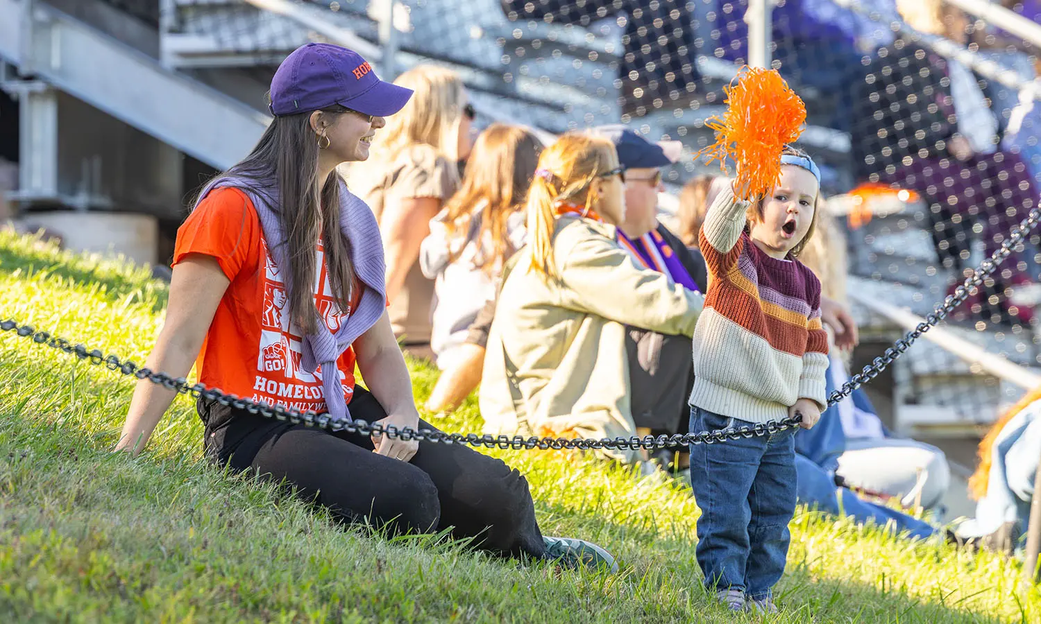 Content Strategy and Editorial Manager Theresa Kelley and her daughter Loretta cheer on the Hobart Soccer team. 