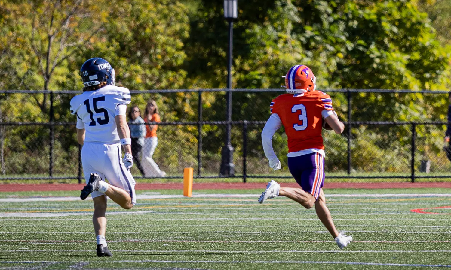 Johnny Harding '28 sprints for a 99-yard touchdown versus Ithaca, the longest pass play in program history. 