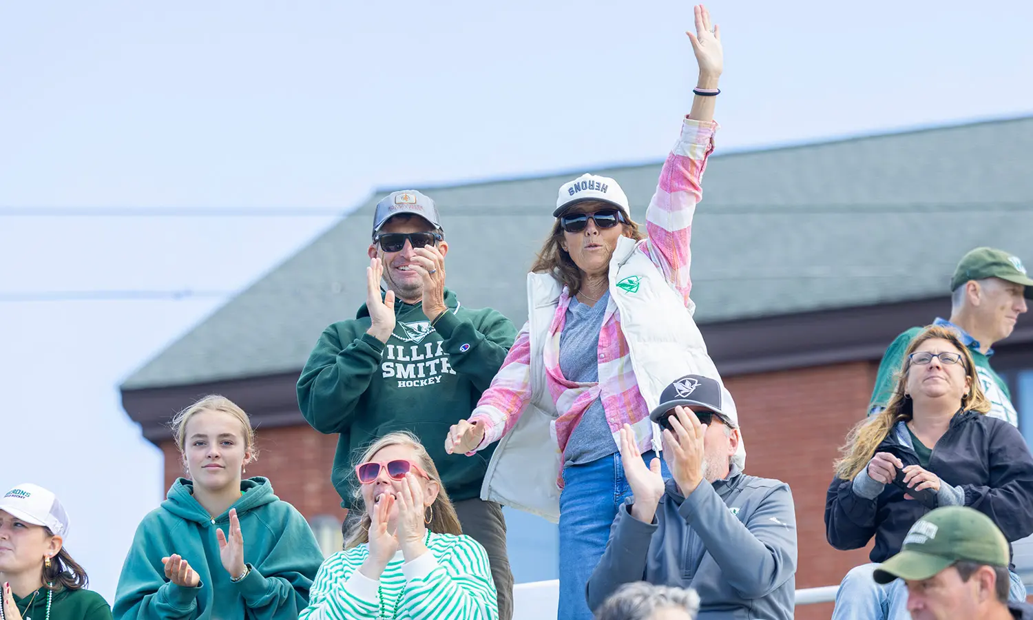 Fans show support to William Smith Field Hockey during their game against Vassar. 