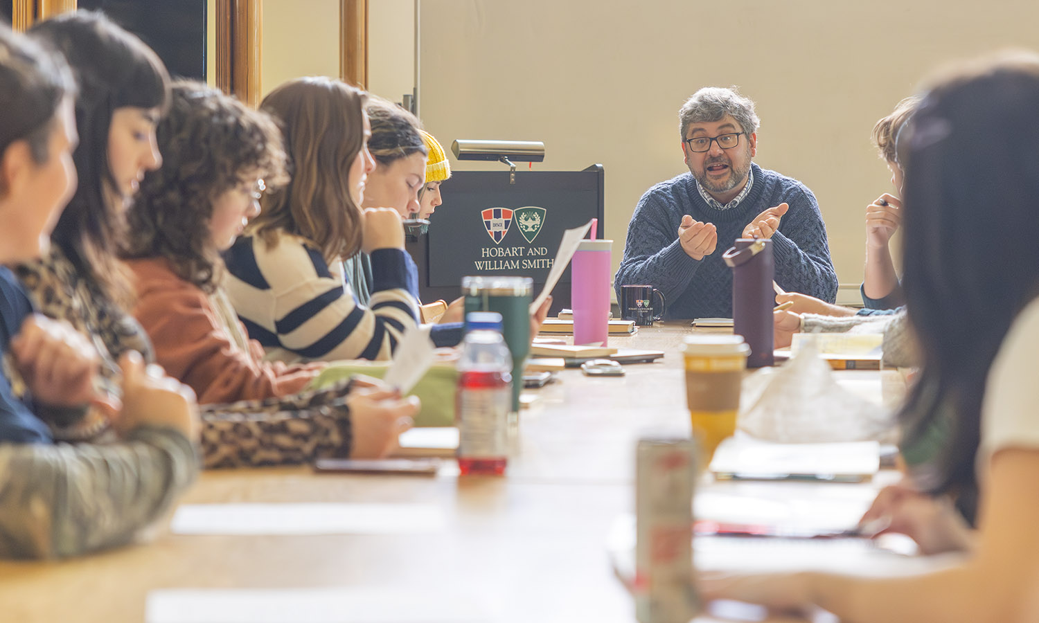 In the Blackwell Room, Associate Professor of English and Creative Writing Rob Carson discusses films based on the works of Shakespeare with students in his senior capstone.