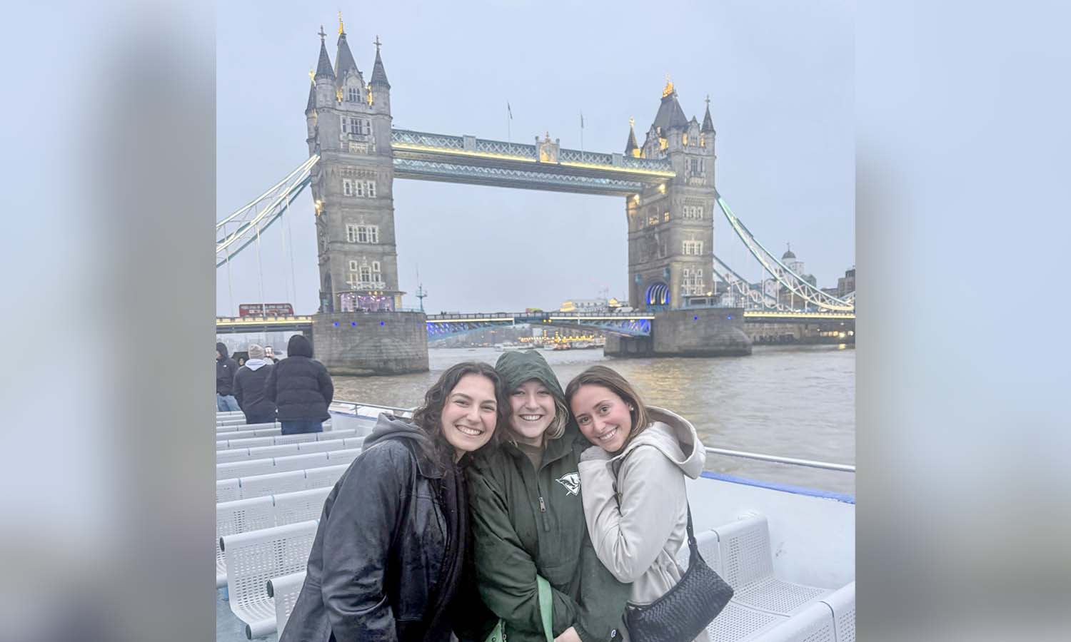 Drexel student Jenna Kozodoy, Rory McCarthy ’27 and Sadie Herr ’27 pose for a photo in front of Tower Bridge while studying abroad in England this semester. 