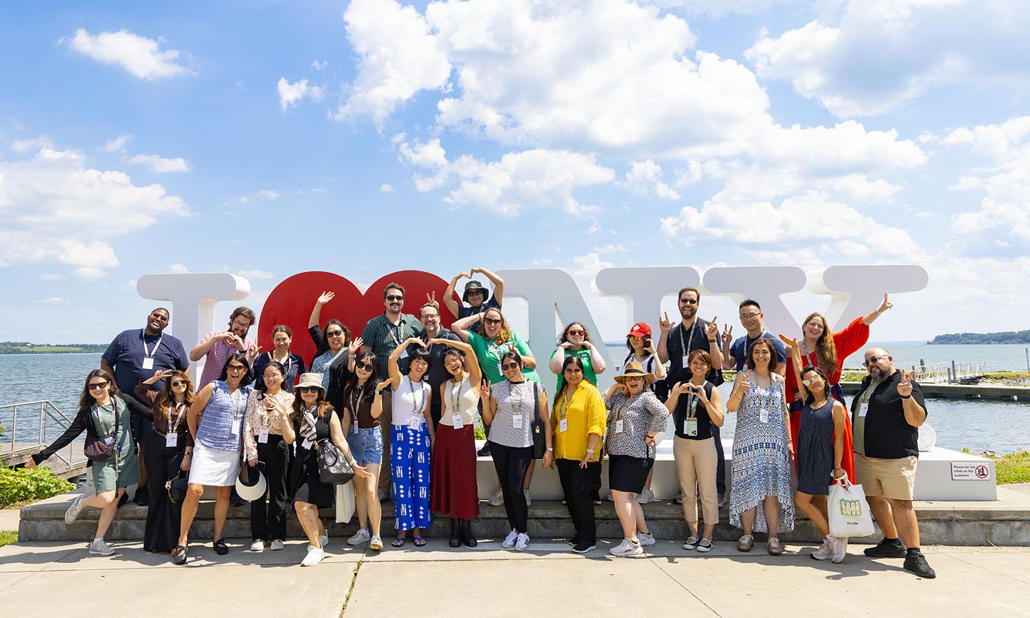 College Advisors from across the world pose for a picture at the Finger Lakes Welcome Center on Seneca Lake after visiting HWS as part of the Upstate NY International Counselor Tour. This annual event gives advisors the opportunity to visit 10 colleges across New York State in 5 days.  