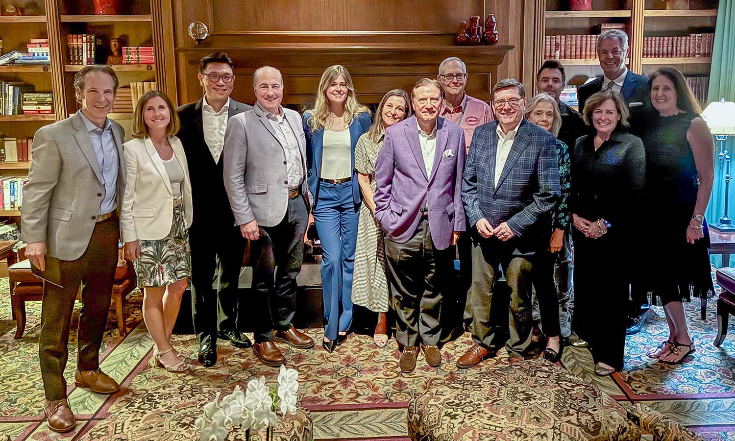 President Mark D. Gearan and alumni gather for a photo at a reception hosted by Martin "Marty" A. Klein III ’73 at the Pacific Club in Newport Beach, Ca.  
