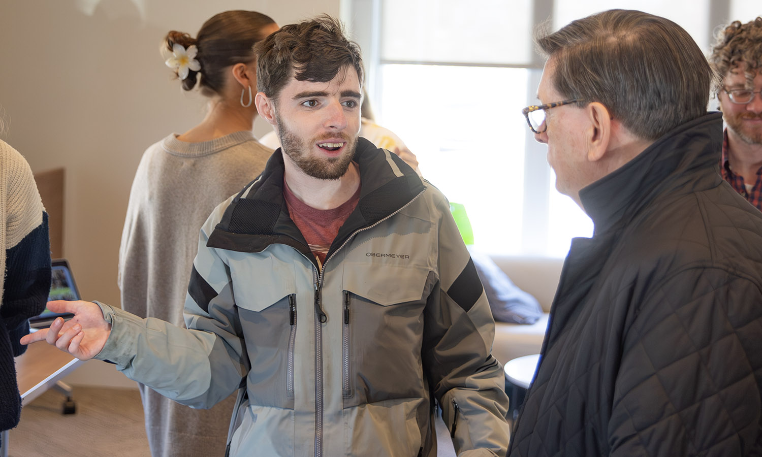 Jack Dwyer ’28 discusses his  Alternative Spring Break trip to Pocahontas State Park in Virginia with President Mark D. Gearan.  