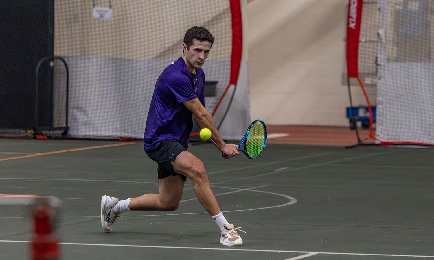 Jose Martinez Barelles ’26 hits a backhand shot during the Hobart tennis team’s 7-0 victory over Drew. 