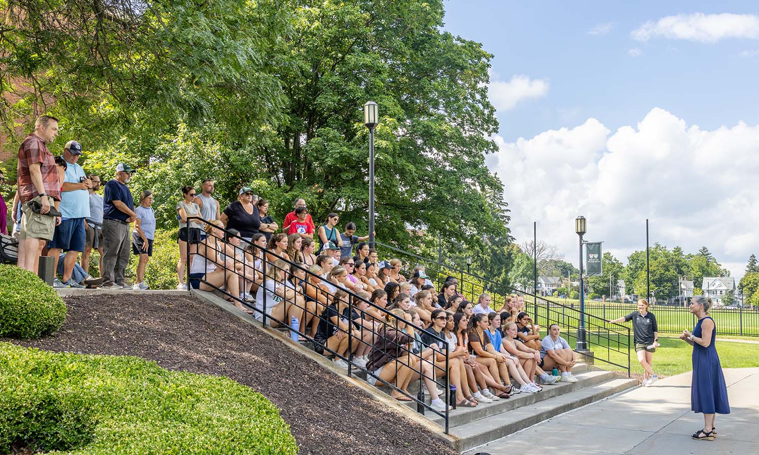 During a William Smith soccer team meeting, Provost and Dean of Faculty Sarah Kirk introduces herself to the players and their families. Kirk serves as the team’s faculty advisor. 
