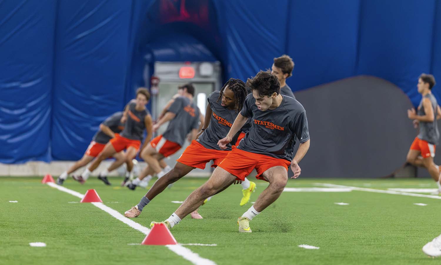 On the first day of preseason, the Hobart soccer team runs through their fitness testing in the Thomas B. Poole ’61 and Family Sports Dome. 