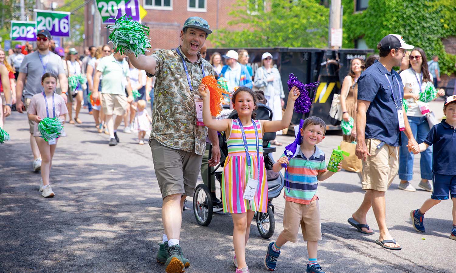 Gil Carr '06 and his children march down Pulteney Street. 