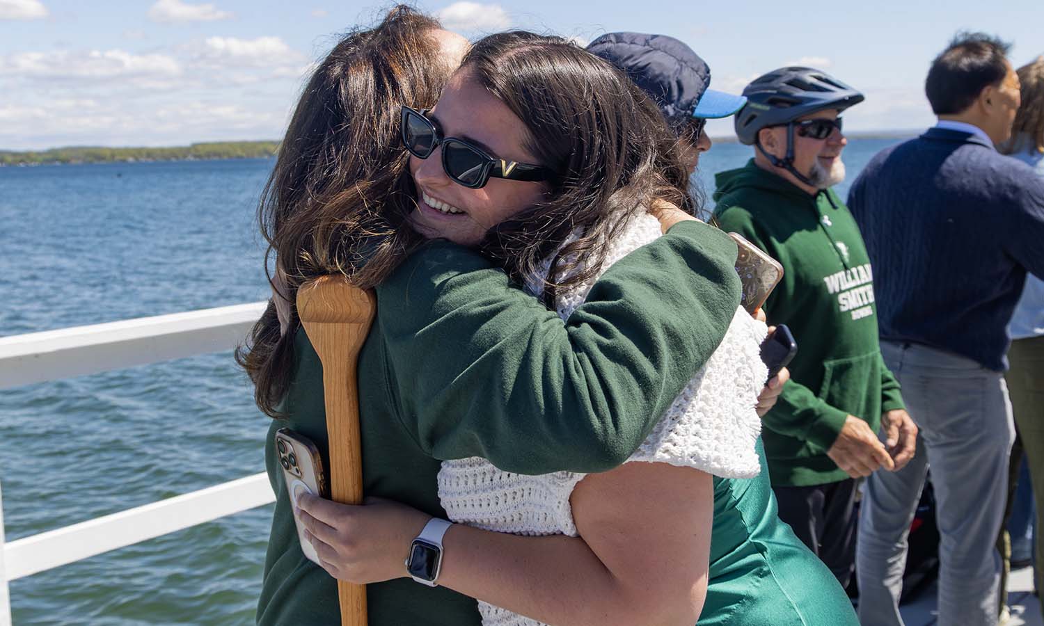 After receiving her paddle, Jacquelyn Sullivan '26 hugs her mother, Alicia Sullivan ’90, P’26.   
