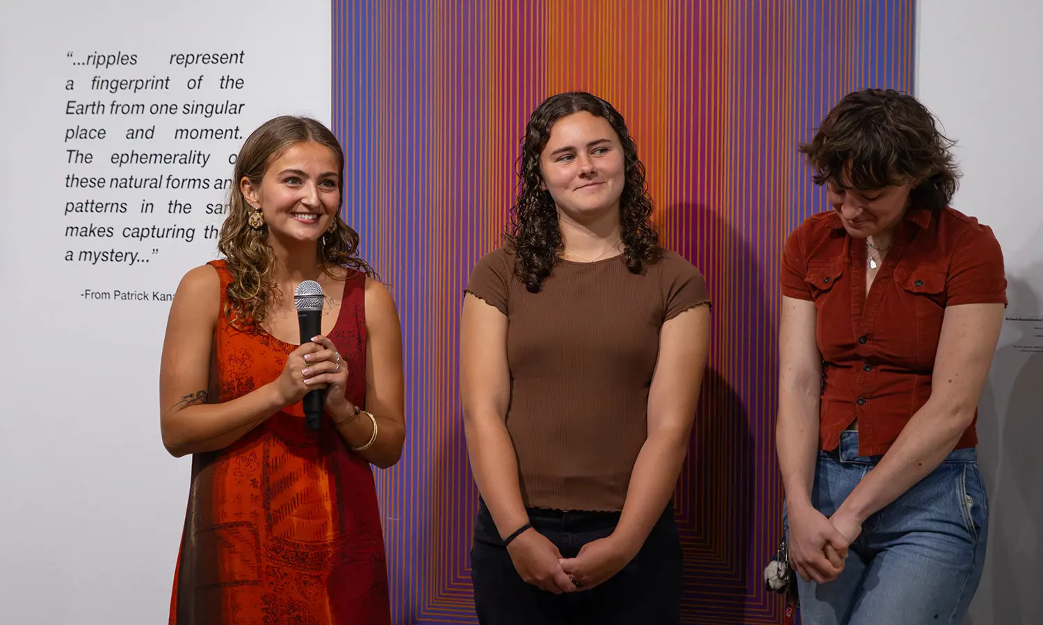 Students in the Studio Art Senior Seminar speak at the opening reception of "Dialogues: The Art and Architecture Faculty Featuring the HWS Art Collection" at the Davis Gallery.  