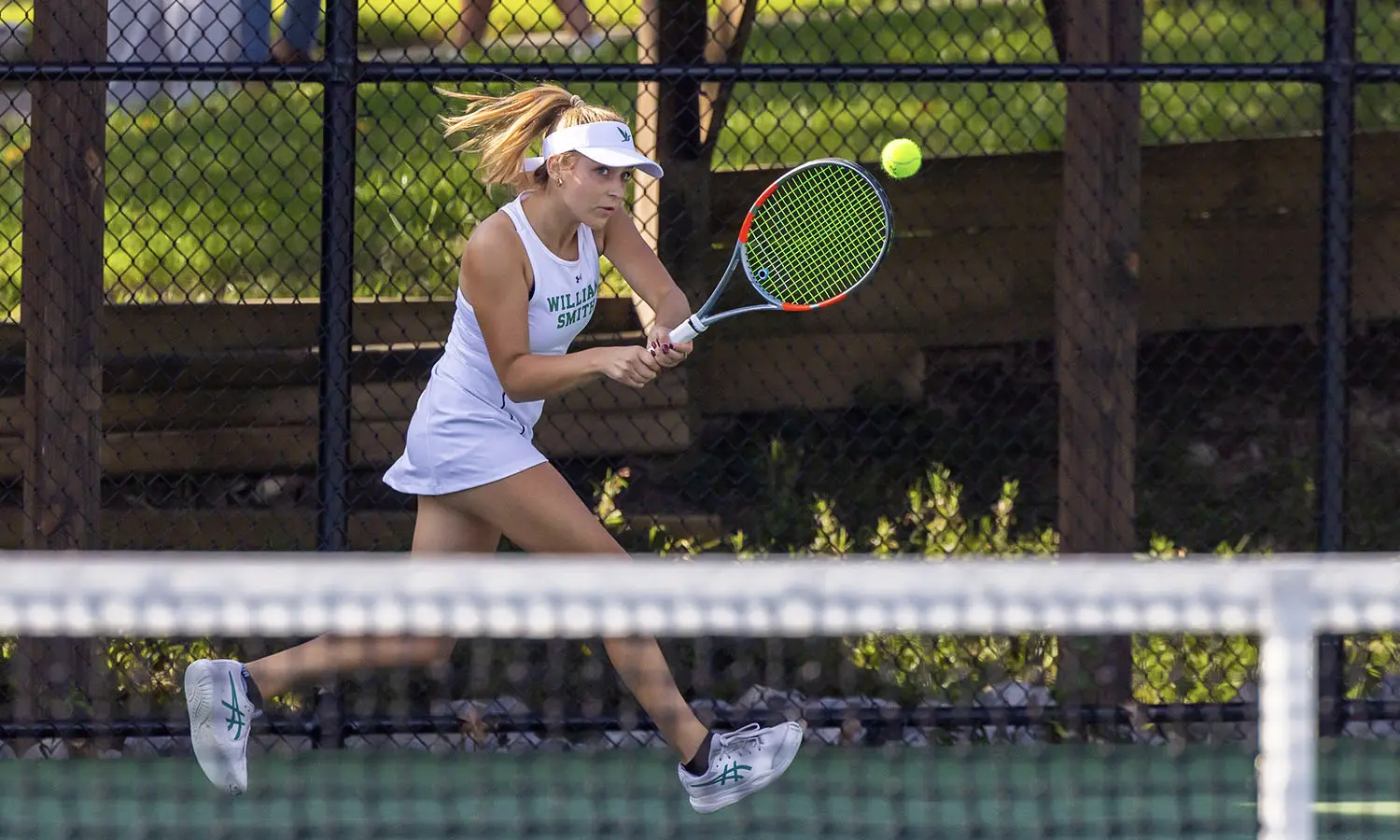 Lillian Stukovsky '30 returns a backhand while competing in the annual Mary Hosking Invitational. 