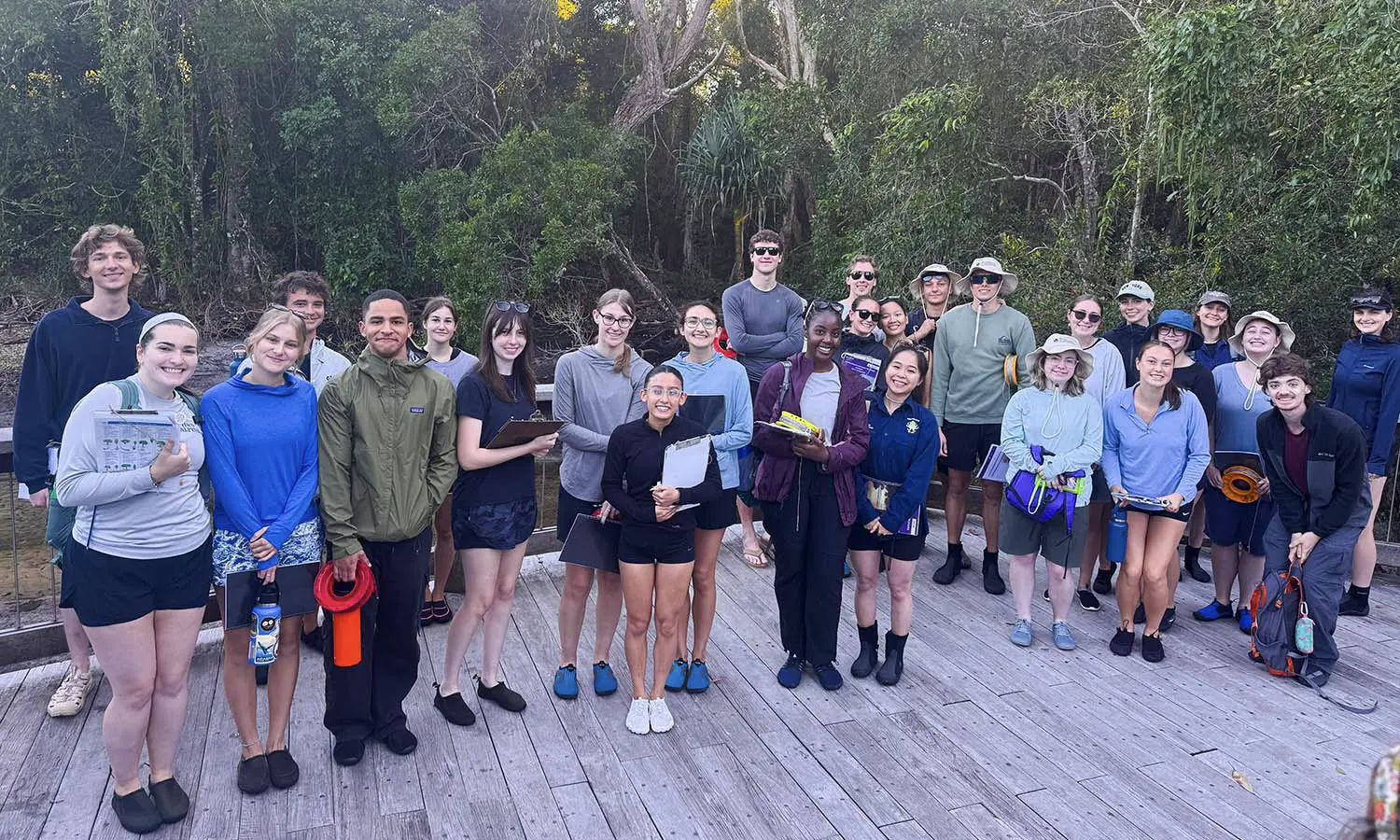 Students studying abroad with Professor of Environmental Studies Kristen Brubaker in Queensland, Australia prepare for field work in the mangrove forest in Minjerribah.  
