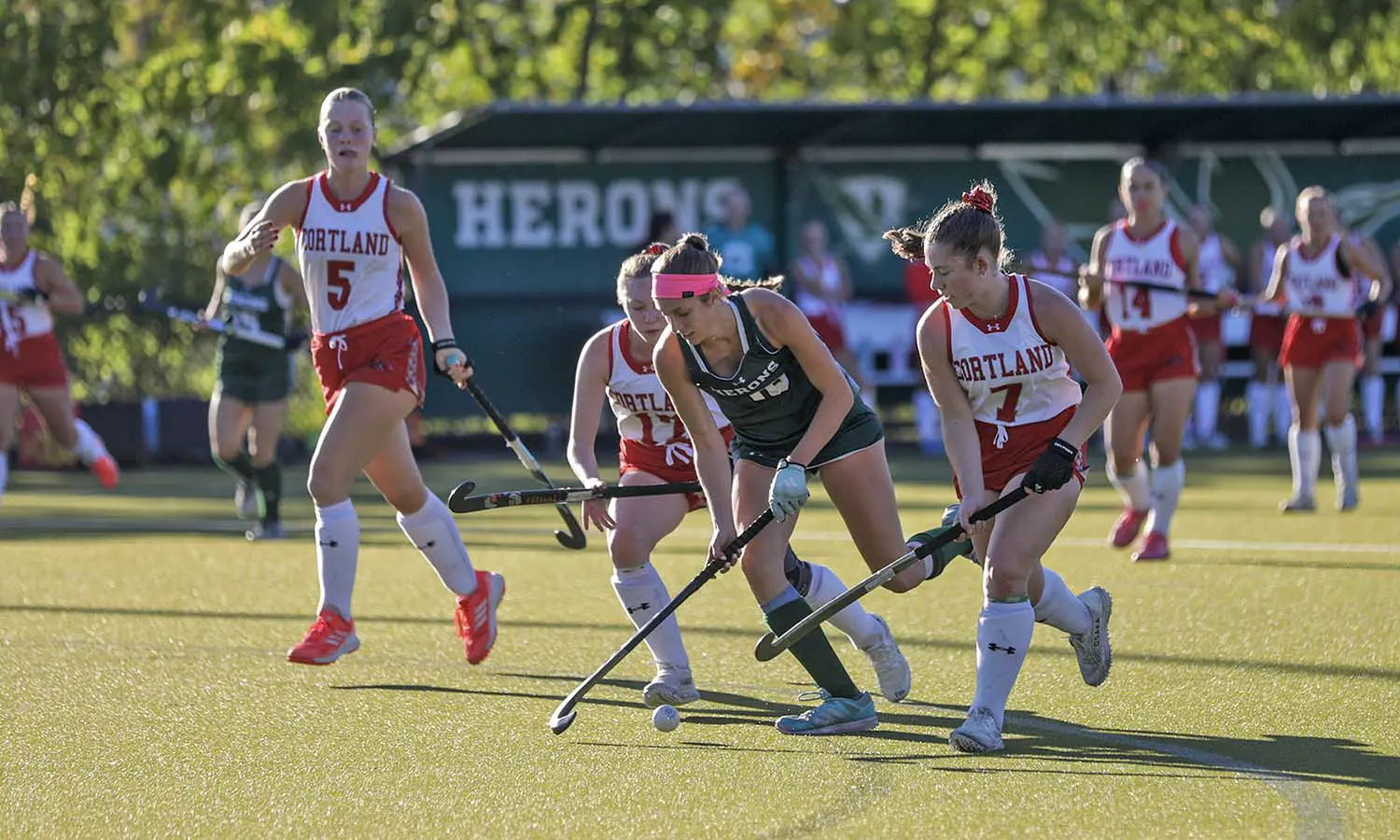 Abigail Mantione '30 takes on the Cortland defense as the William Smith field hockey team battled the Red Dragons in a non-conference game on McCooey Field Wednesday. 