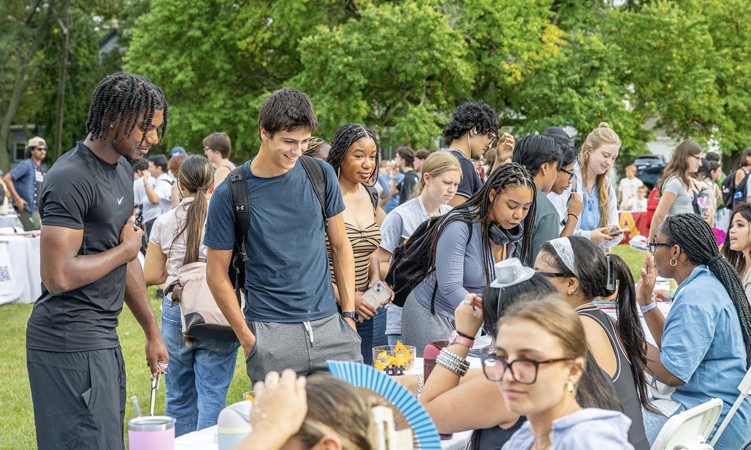 Students attend the annual involvement expo to sign up for clubs on Smith Lawn. 
