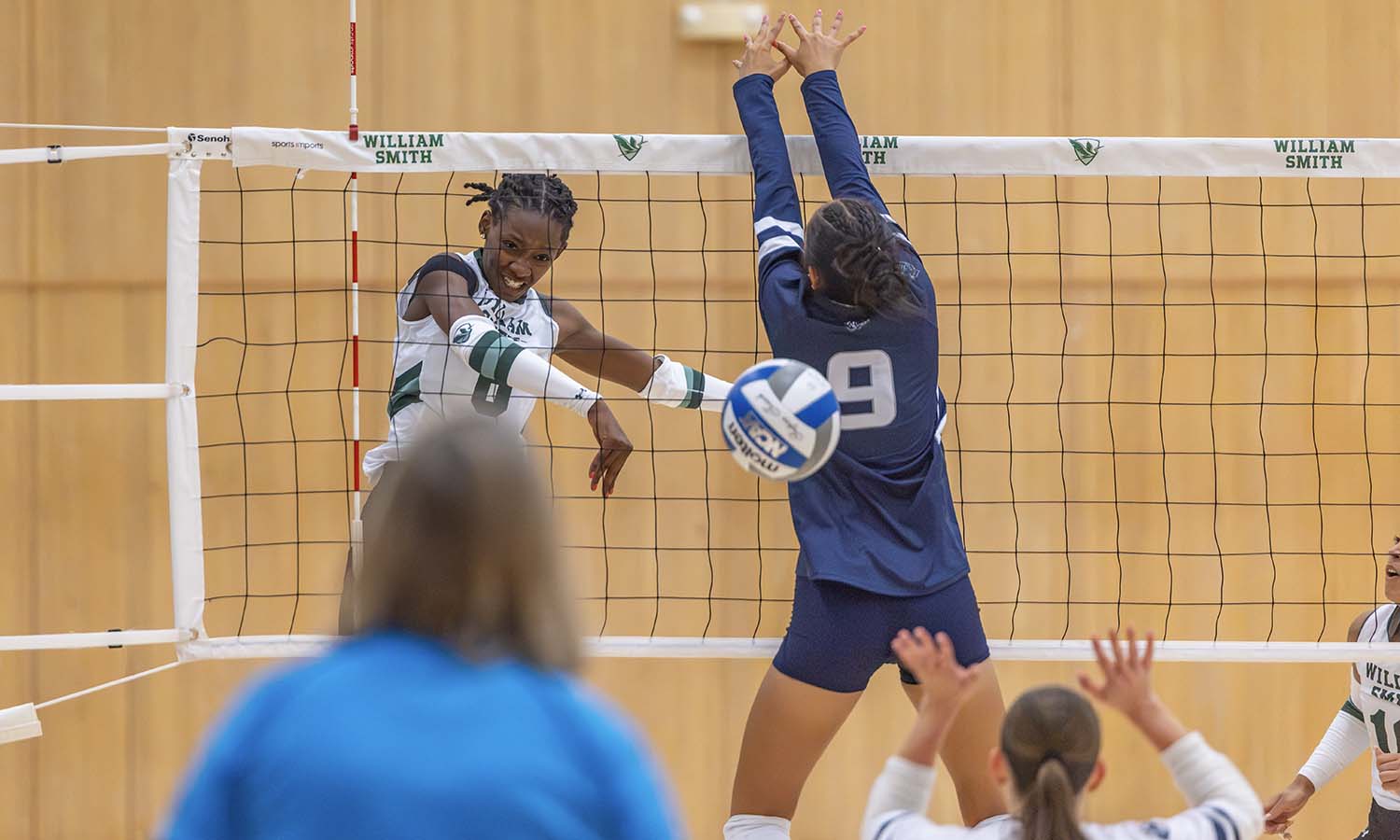 Arielle Newsome '28 tallies one of her six kills as the William Smith volleyball team opened its season with a 3-0 sweep of SUNY Geneseo. 