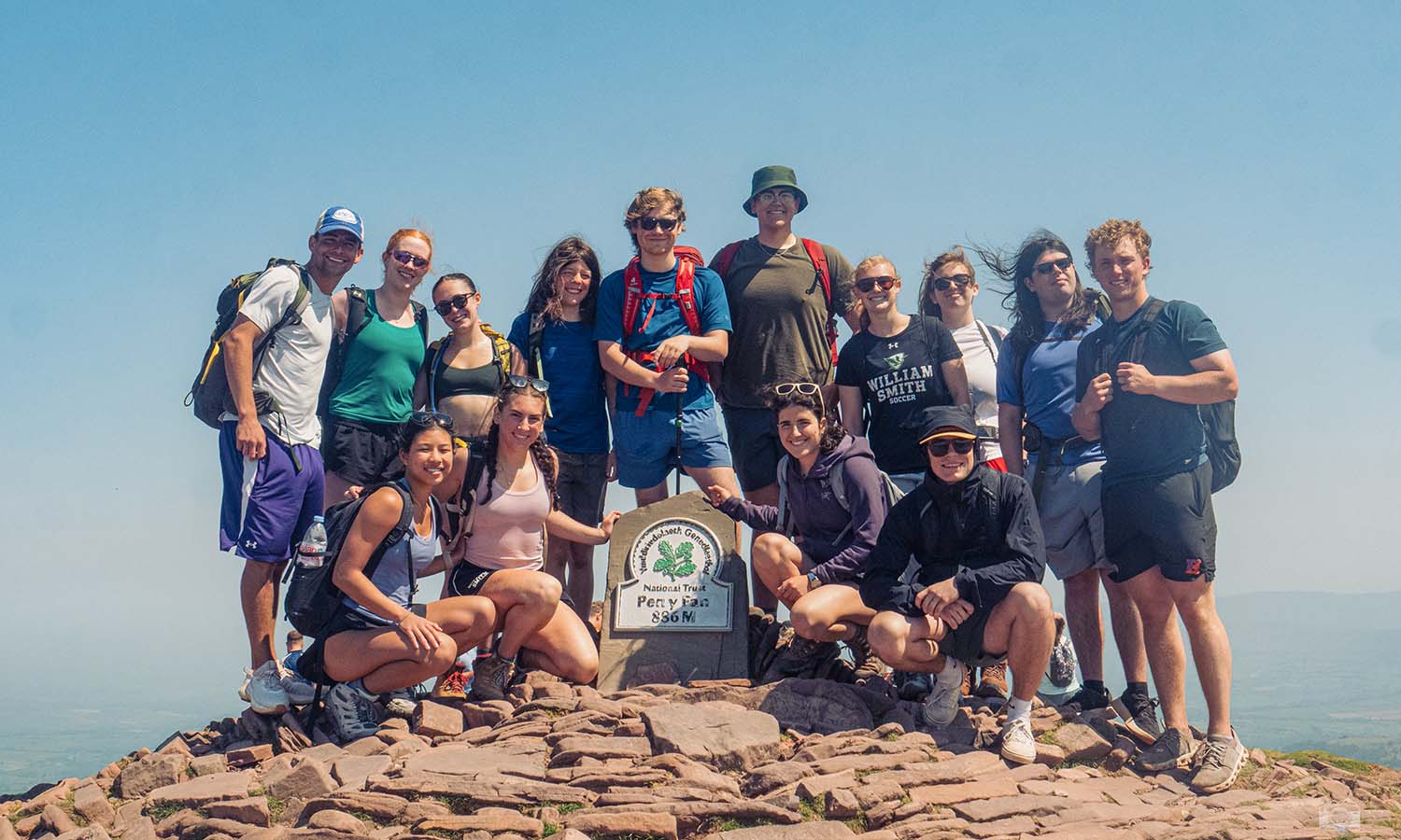 This week, we're highlighting students whose summer experiences are taking them around the world. Here, students pose at the summit of Pen y Fan, the highest peak in Southern Wales, while studying abroad with Associate Dean David Mapstone ‘93, P’21. Photo by Nekorrah Raynor. 