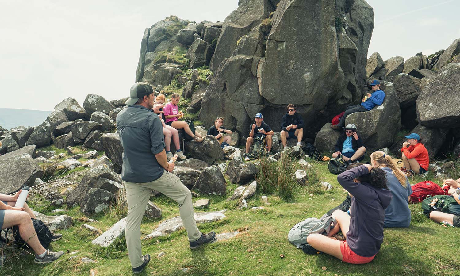 During a lunch break on the Preseli Hills, students learn more about the Bronze Age inhabitants of West Wales. Photo by Nekorrah Raynor. 