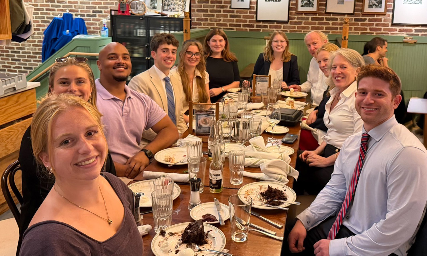 Students who participated in the Frelinghuysen Assembly Internship Program, and who held internships at institutions, organizations and offices in and around Washington, D.C., share a meal with former U.S. Rep. Rodney Frelinghuysen ’69, L.H.D. ’01 (R-NJ), who created and funds the program. Joining them is program coordinator and Attorney Karin Richards Moore ’89.   