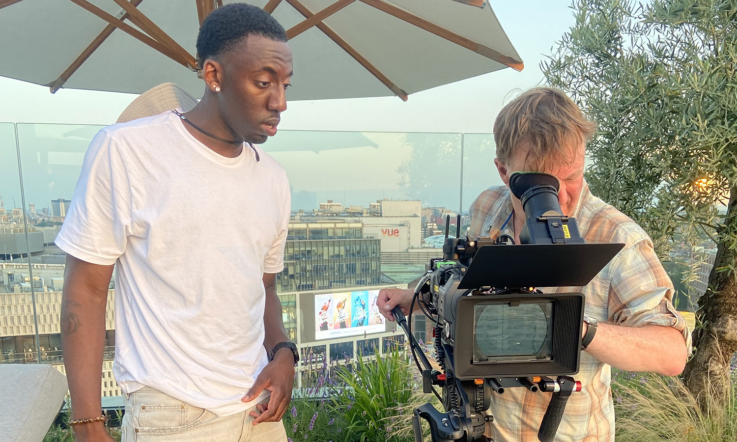 Allen Mordi Jr. '28 (left) gained firsthand experience this summer in branding, design and film production at Placebrand, a London consultancy specializing in real estate and urban developments.  