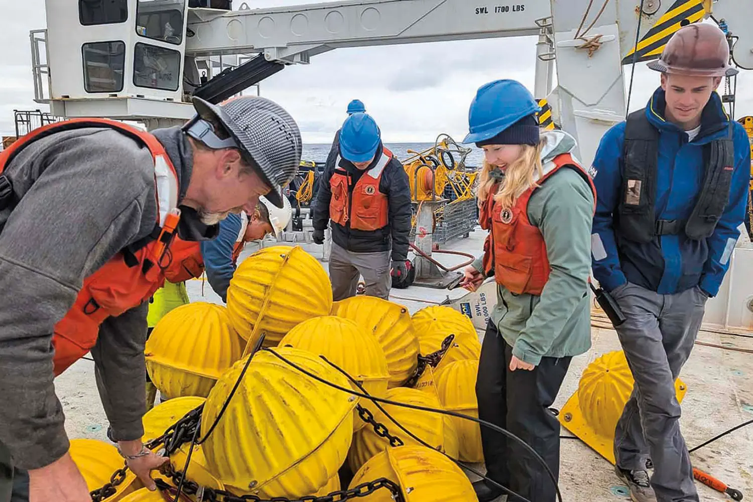 Fiona Howes '27 dismantles a recovered mooring in the North Atlantic
