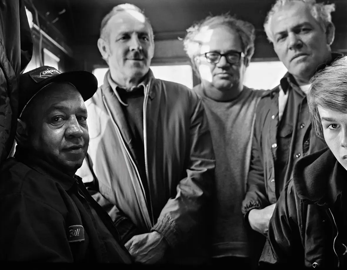 Five regulars at the counter — cops, firemen, plumbers, electricians