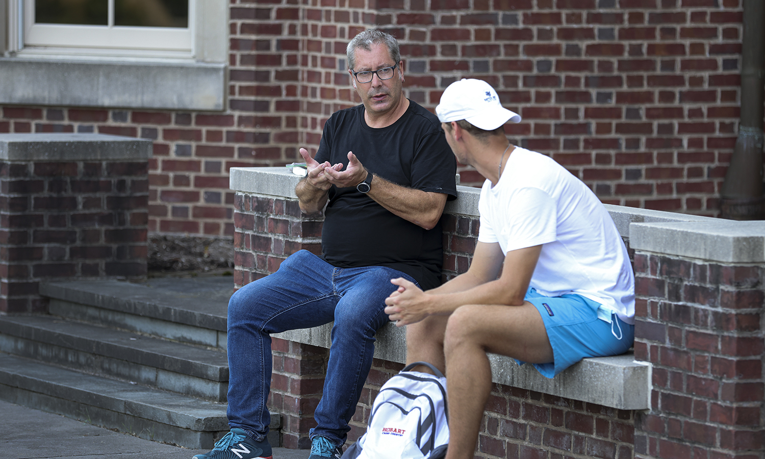 Prof. Paul Passavant meets with a student