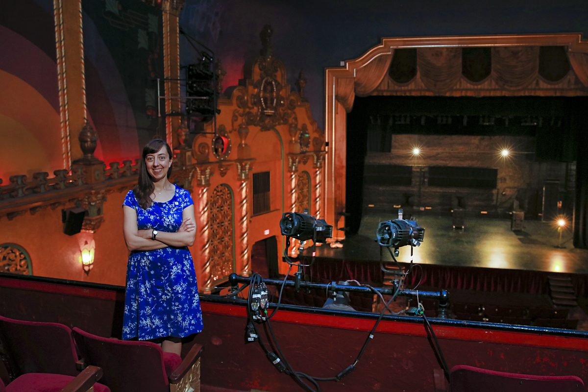 Chris Woodworth standing inside the Smith Opera House