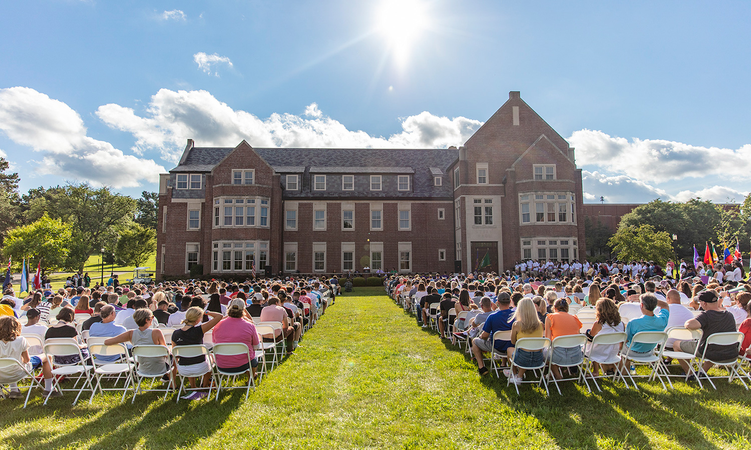 New students and their families gather on Stern lawn