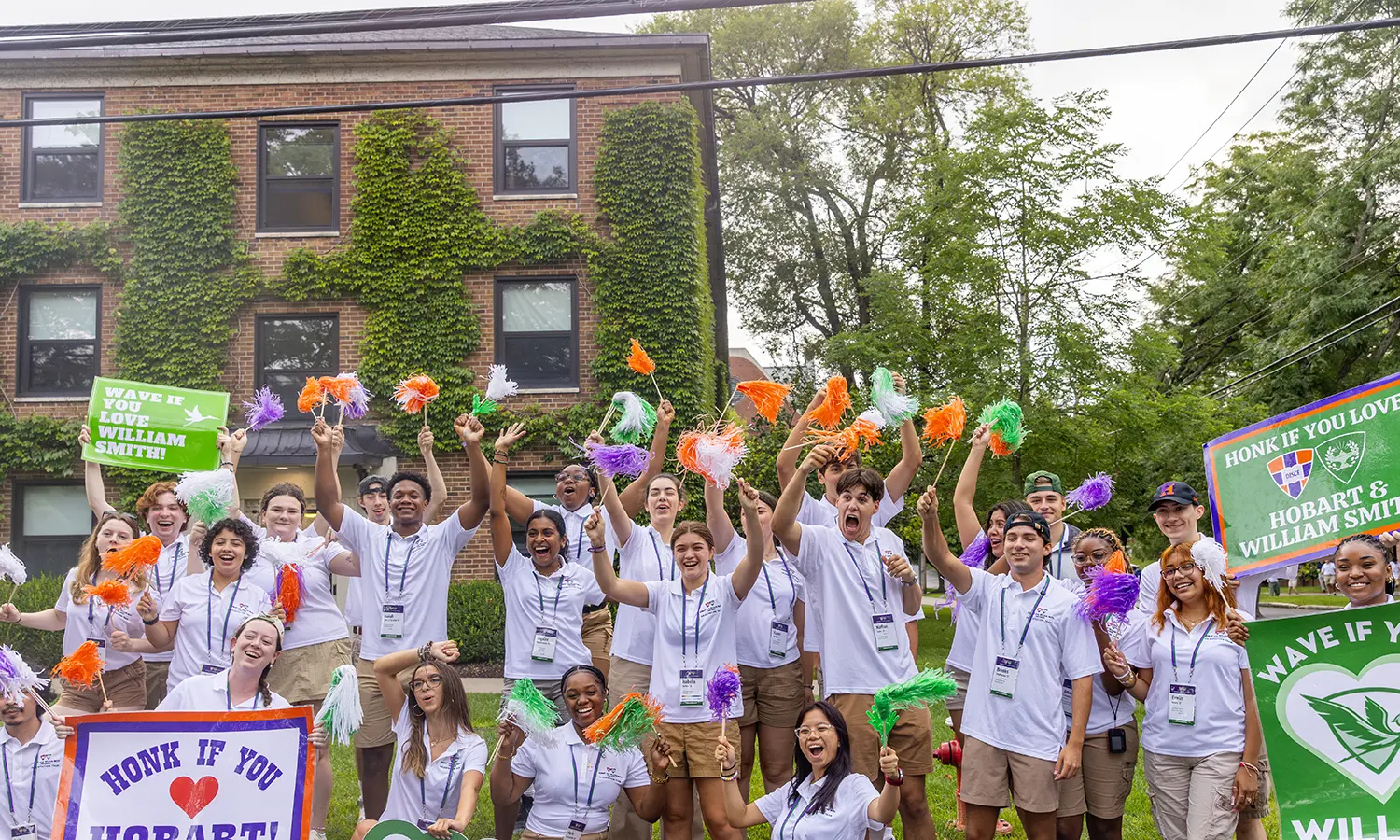 Current students welcome new students to campus.