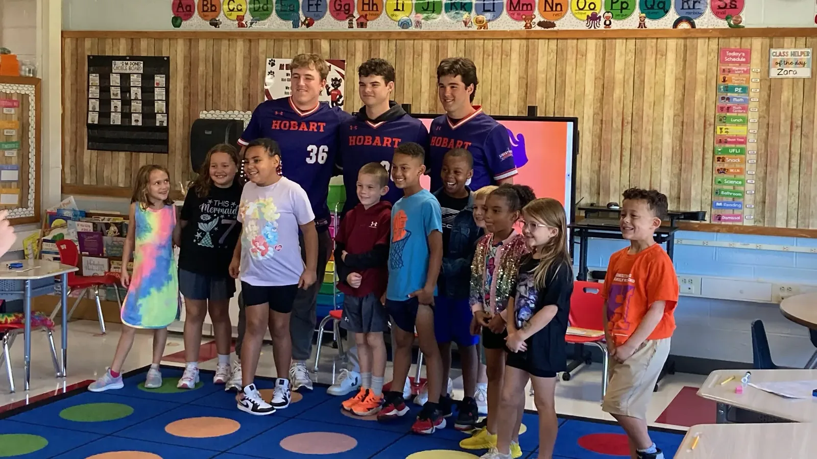Hobart baseball student-athletes visit a local elementary school classroom