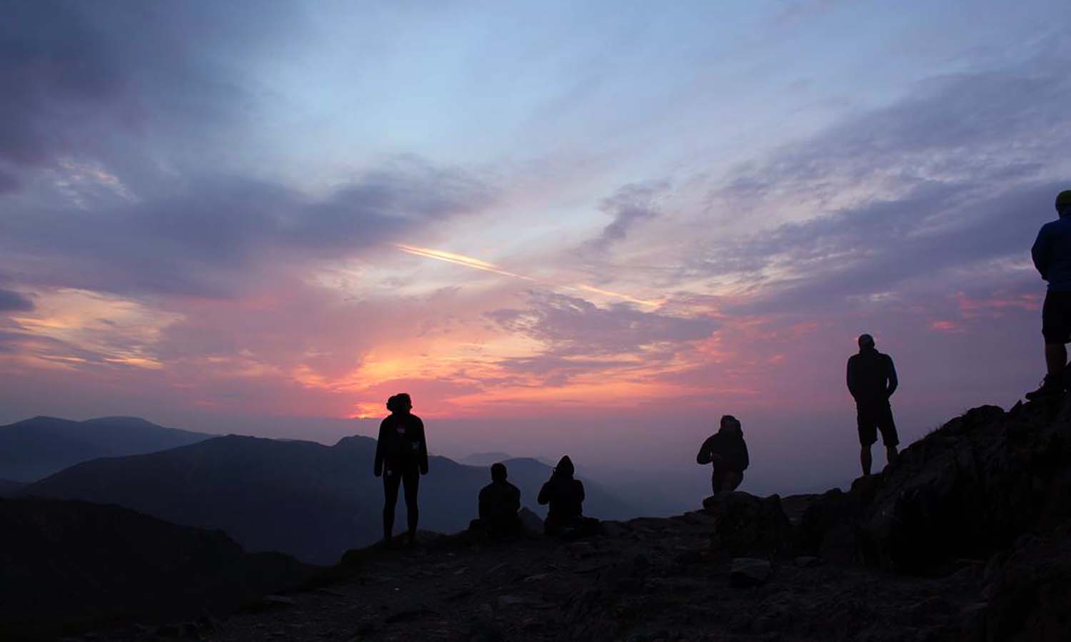 Students on a mountainside in Wales