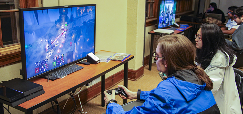 Students attend E-Scape Game Night in Coxe Hall.