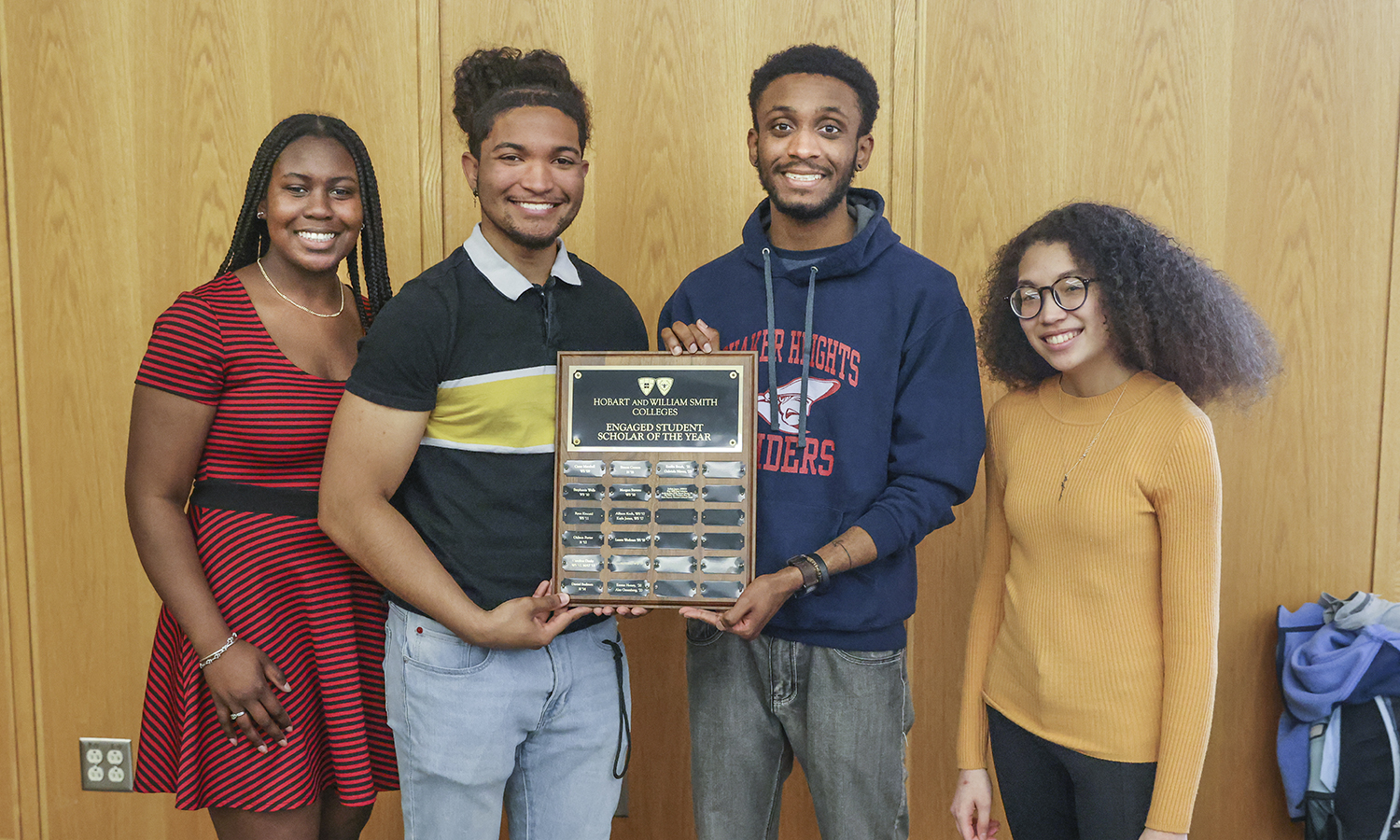 Students gather for a photo with their award