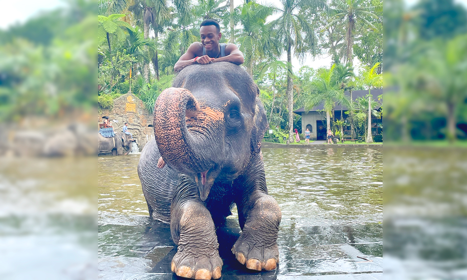 Ahmed Wise rides an elephant