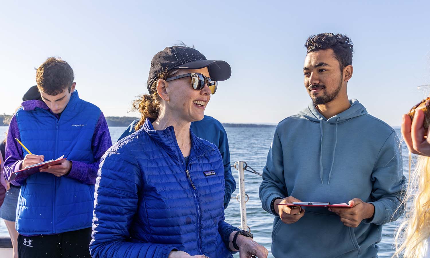 Associate Professor of Geoscience Tara Curtin with students on the R/V William Scandling.