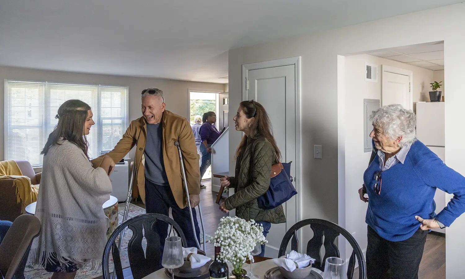 Stuart Piltch ’82, P’11 tours one of the newly renovated apartments at the Piltch Family Commons following the dedication ceremony.