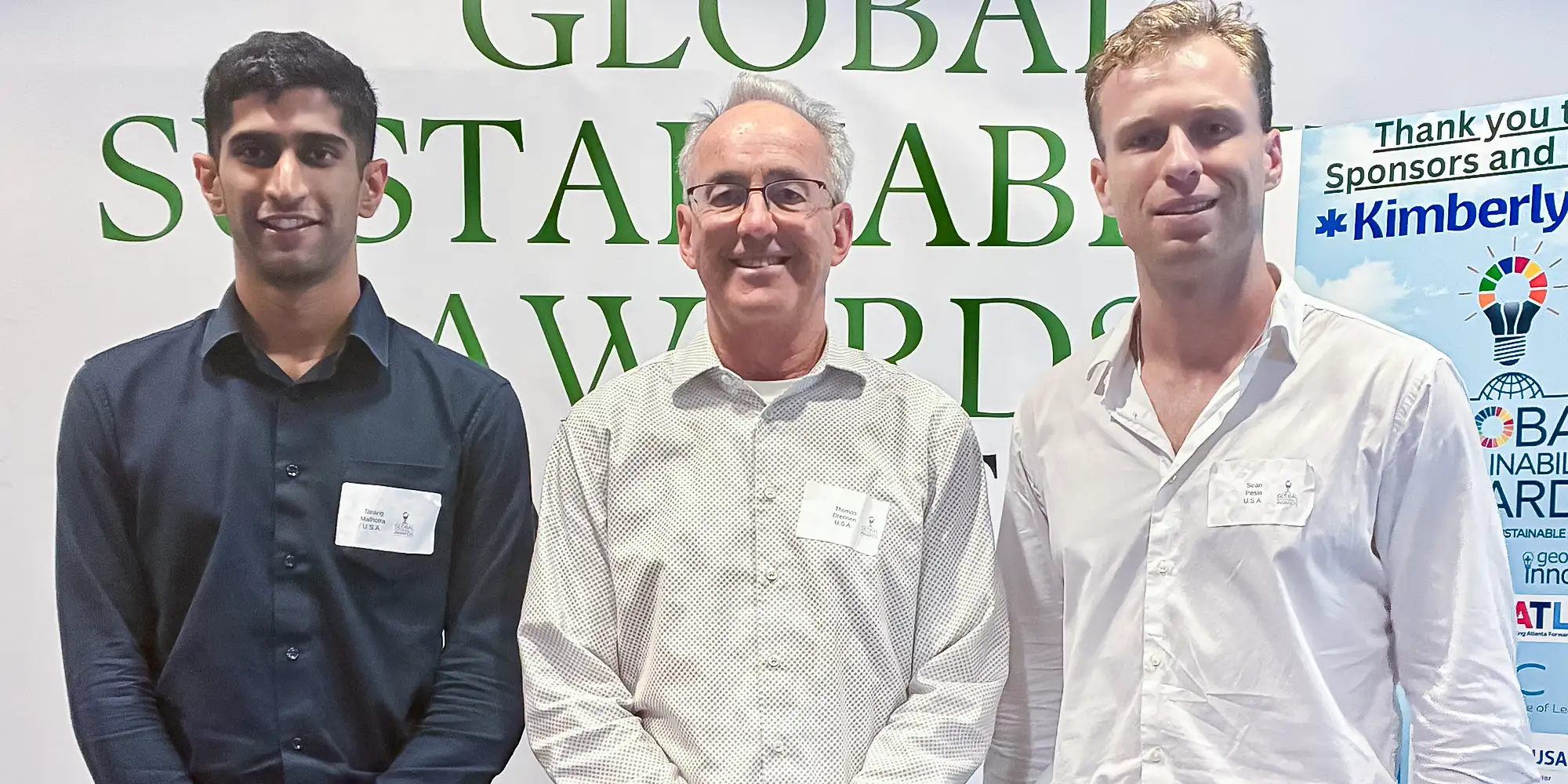Tarang Malhotra ’26, Professor Tom Drennen and Sean Pesin ’24 at the Global Sustainability Awards